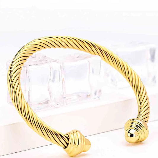 Unveiling Elegance: The Allure of Stainless Steel Gold-Colored Twisted Open Bracelets